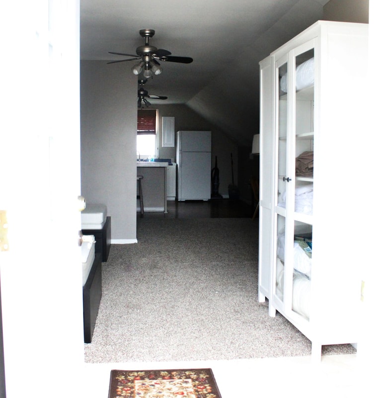 Interior of the Ranch Apartment showing open living space and kitchen